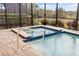 Pool area with spa and patio furniture at 26866 Weiskopf Dr, Englewood, FL 34223