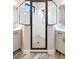 Large walk-in shower with glass enclosure at 26866 Weiskopf Dr, Englewood, FL 34223