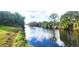 Tranquil canal view, ideal for relaxing and enjoying nature at 328 Baytree Dr, Rotonda West, FL 33947