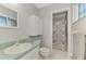 Bathroom with a shower/tub combo, toilet and vanity at 3460 Lullaby Rd, North Port, FL 34287