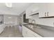 Clean lines and white cabinetry define this kitchen at 3460 Lullaby Rd, North Port, FL 34287