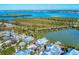 Aerial view showcasing a house on the waterfront with boat access at 534 Gulf Blvd, Placida, FL 33946