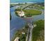 Aerial view highlighting the ferry access to the property at 534 Gulf Blvd, Placida, FL 33946