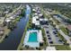 Aerial view of community pool and surrounding area at 66 Boundary Blvd # 271, Rotonda West, FL 33947