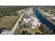 Aerial view of community, showing building layout and canal at 66 Boundary Blvd # 271, Rotonda West, FL 33947