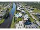 Community overview; building, pool, and canal views at 66 Boundary Blvd # 271, Rotonda West, FL 33947