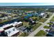 Wide aerial showcasing community and waterfront location at 66 Boundary Blvd # 271, Rotonda West, FL 33947