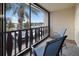 Relaxing balcony with patio furniture and scenic community views at 66 Boundary Blvd # 271, Rotonda West, FL 33947