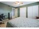 Bright bedroom with double bed and plenty of closet space at 66 Boundary Blvd # 271, Rotonda West, FL 33947