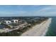 Aerial view of coastline, beach, and waterway at 710 Albee W Rd, Nokomis, FL 34275