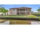 Two-story home with canal views and backyard patio at 710 Albee W Rd, Nokomis, FL 34275