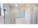 Bathroom with a walk-in shower and marble tile at 7330 Printer St, Port Charlotte, FL 33981