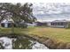 Waterfront view of manufactured homes in a community setting at 735 Summersea Ct, Englewood, FL 34223