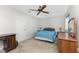 Bedroom with double bed and wood furniture at 7379 Rosemont Dr, Englewood, FL 34224