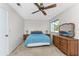 Bedroom with double bed and wood furniture at 7379 Rosemont Dr, Englewood, FL 34224