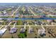 Aerial view of the property and neighborhood, highlighting the house's location at 738 Boundary Blvd, Rotonda West, FL 33947