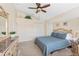 Spacious bedroom with double doors leading to a closet at 738 Boundary Blvd, Rotonda West, FL 33947