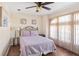 Cozy bedroom with a queen bed and ample natural light at 738 Boundary Blvd, Rotonda West, FL 33947