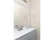 Bathroom with vanity, mirror and updated fixtures at 850 E 2Nd St, Englewood, FL 34223