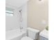 Bathroom with tub, shower, and toilet at 850 E 2Nd St, Englewood, FL 34223