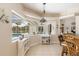 Kitchen with breakfast nook and view of the pool and patio at 110 Barracuda Dr, Placida, FL 33946