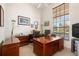 Home office with large desk, ample storage and natural light at 110 Barracuda Dr, Placida, FL 33946