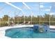 Inviting pool and spa with lounge chairs at 110 Barracuda Dr, Placida, FL 33946