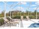 Enjoy the sun on lounge chairs near the pool at 110 Barracuda Dr, Placida, FL 33946