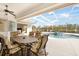 Enjoy dining and relaxing by the pool at 110 Barracuda Dr, Placida, FL 33946