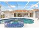 Large pool and spa with a covered lanai at 110 Barracuda Dr, Placida, FL 33946