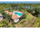 Community pool and clubhouse nestled on the lake at 11479 Blackfin St, Venice, FL 34292