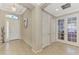 Bright and spacious entryway with tile flooring and neutral walls at 11479 Blackfin St, Venice, FL 34292