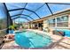 Enjoy this screened in pool and patio area with plenty of space for relaxation at 11479 Blackfin St, Venice, FL 34292