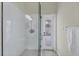 Bathroom with shower, glass enclosure, and exterior access at 1171 Yarmouth St, Port Charlotte, FL 33952