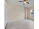 Spacious bedroom with ceiling fan and light neutral walls at 1171 Yarmouth St, Port Charlotte, FL 33952