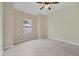 Bright bedroom with a window and ceiling fan at 1171 Yarmouth St, Port Charlotte, FL 33952