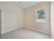 Bright bedroom featuring neutral walls and flooring at 1171 Yarmouth St, Port Charlotte, FL 33952