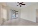 Bright Gathering room featuring sliding doors to the pool area and light-colored flooring at 1171 Yarmouth St, Port Charlotte, FL 33952