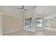 Living room with pool view and light hardwood floors at 1171 Yarmouth St, Port Charlotte, FL 33952