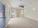 Living room with sliding doors leading to the pool area at 1171 Yarmouth St, Port Charlotte, FL 33952