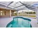 Relaxing screened pool and patio area at 1171 Yarmouth St, Port Charlotte, FL 33952