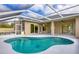 Inviting screened pool and patio area at 1171 Yarmouth St, Port Charlotte, FL 33952