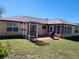 Backyard view of house showing patio, grill and pergola at 13278 Carter Ave, Port Charlotte, FL 33981