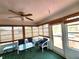 Relaxing sunroom featuring comfortable seating and ample natural light at 13278 Carter Ave, Port Charlotte, FL 33981