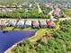 Aerial view of luxury homes with private pools and lush landscaping at 13376 Creekside Ln, Port Charlotte, FL 33953