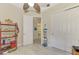 Bright bedroom with a large closet and access to a bathroom at 13376 Creekside Ln, Port Charlotte, FL 33953