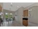 Kitchen nook area with a glass-top table and chairs, next to kitchen at 13376 Creekside Ln, Port Charlotte, FL 33953