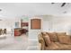 Living area with a partial view of the kitchen at 13478 Carrie Ave, Port Charlotte, FL 33953