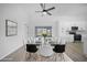 Dining area with glass table and modern chairs at 142 Broadmoor Ln, Rotonda West, FL 33947