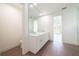 Modern bathroom with double vanity and large mirror at 159 Colony Point Dr, Punta Gorda, FL 33950